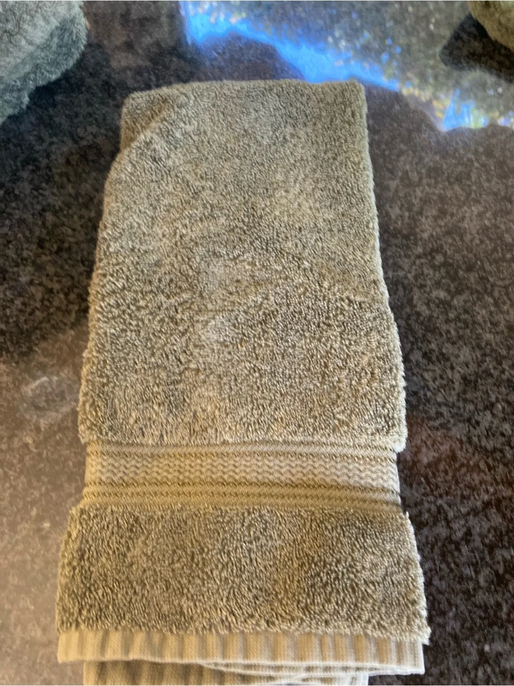 2 Croscill towels, 3 hand towels and 1 bath mat.